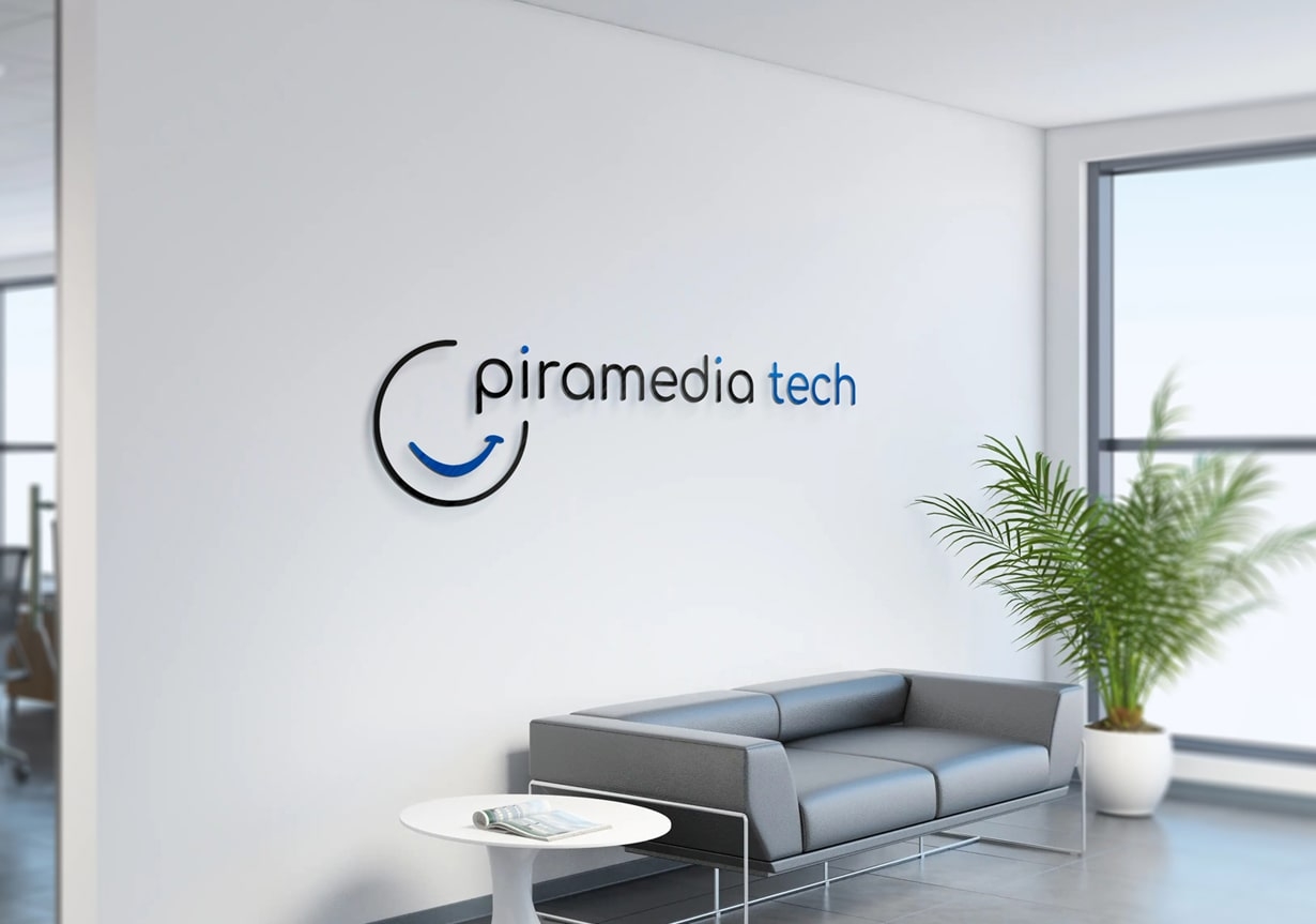 A view of the piramedia tech's logo on an office wall